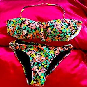 Two piece swim suit like new size medium Dillards